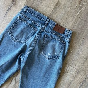 Calvin Klein distressed medium wash denim